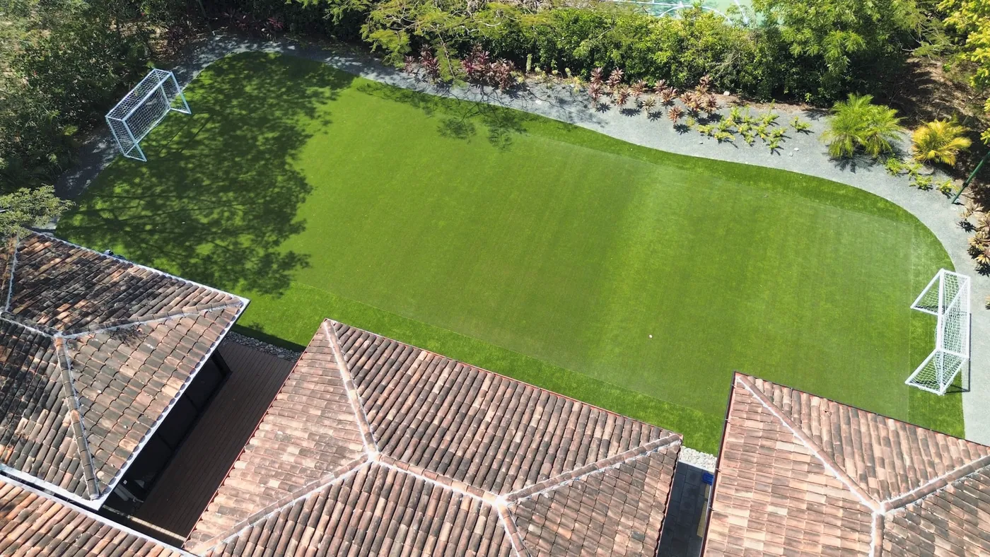Drone view of a turf soccer field with goals at each end